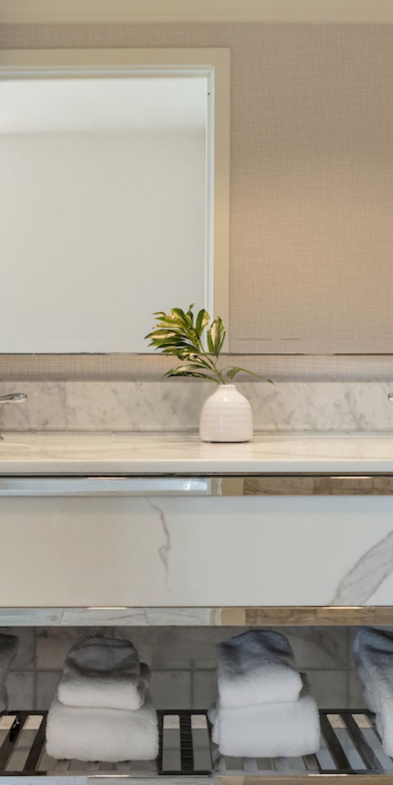 Marble double vanity with mirrors & floral accent