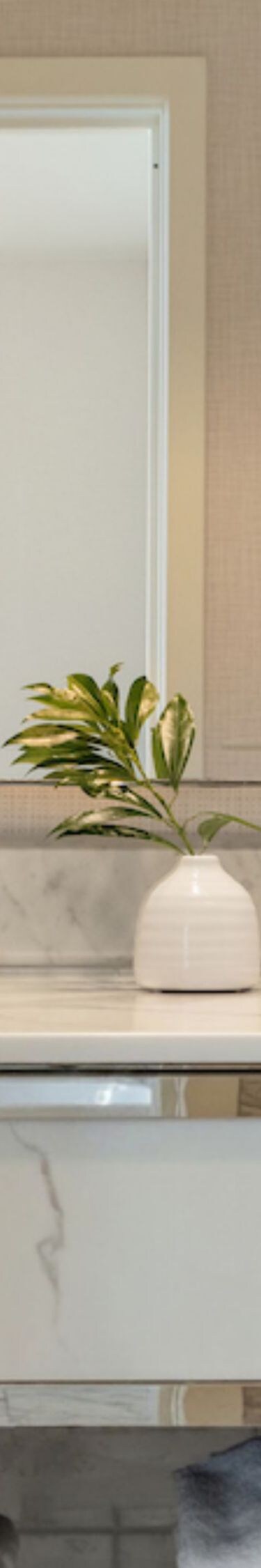 Marble double vanity with mirrors & floral accent
