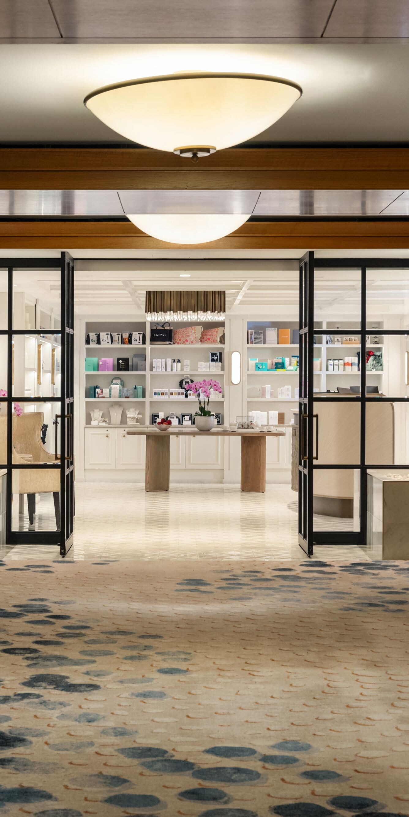 Spa entrance with seating and retail area