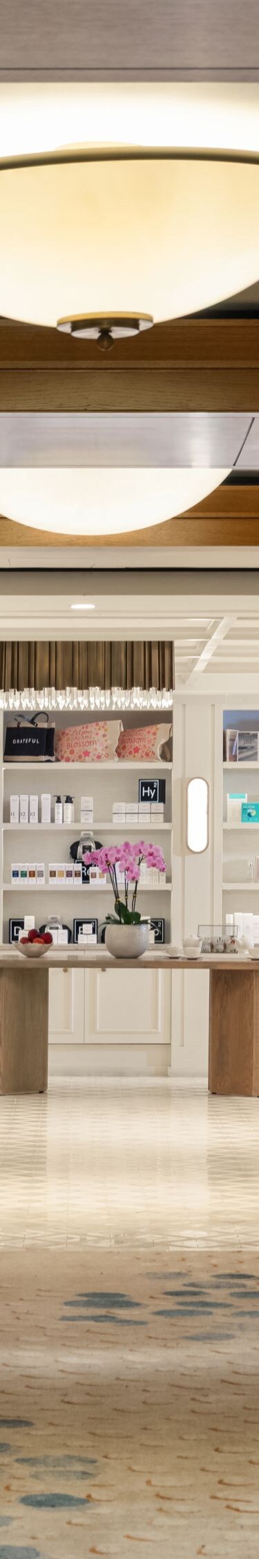 Spa entrance with seating and retail area