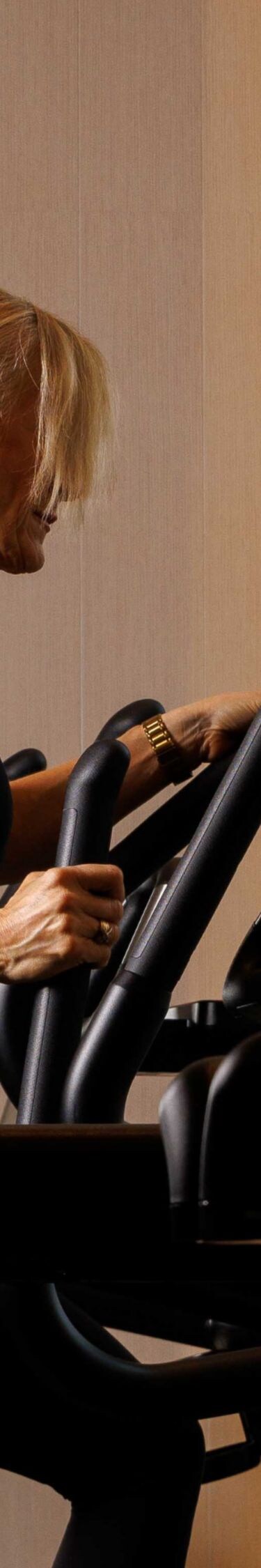 Guest using cardio equipment in a calm