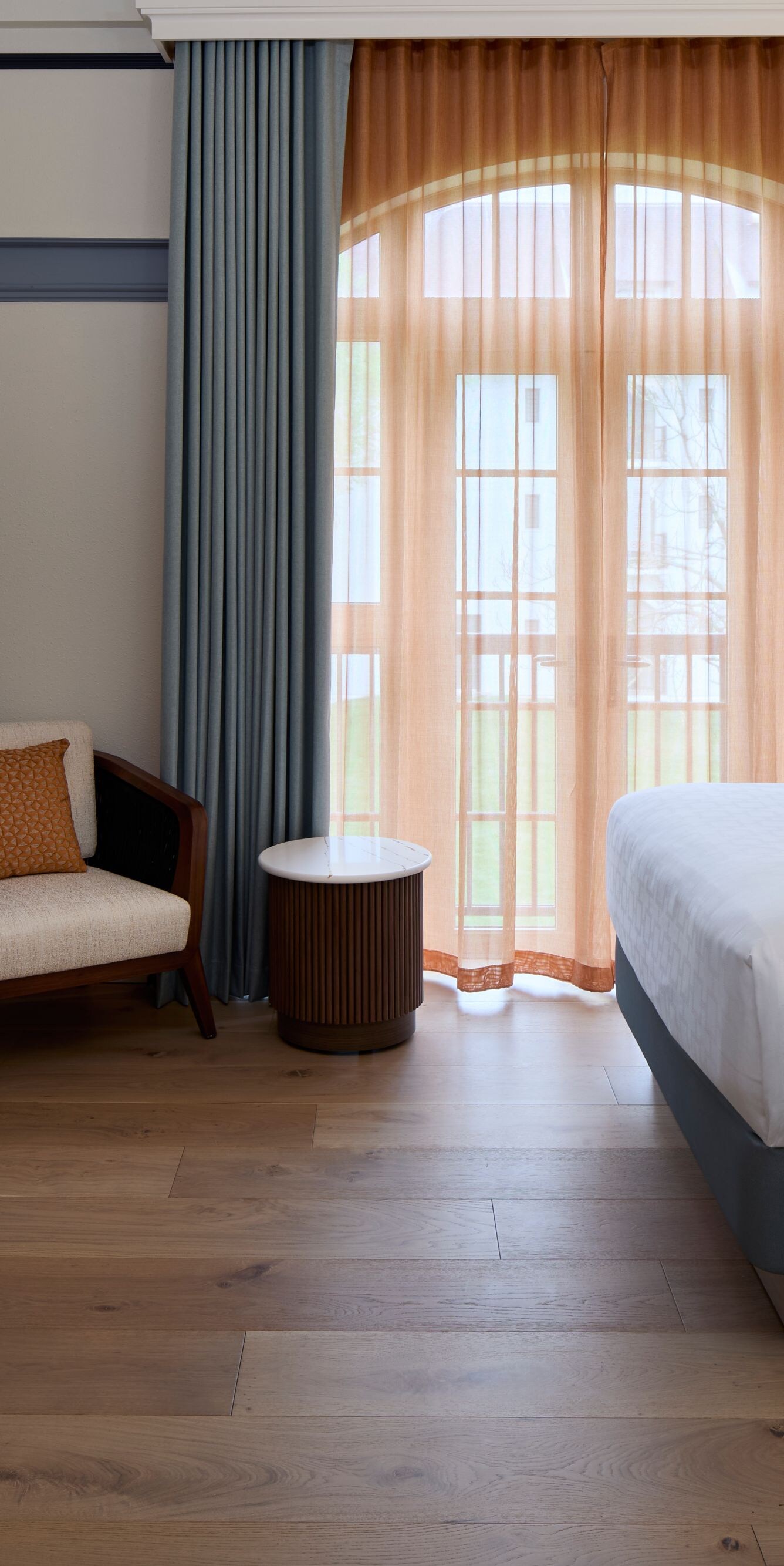 Two beds, table and chair, sofa, TV