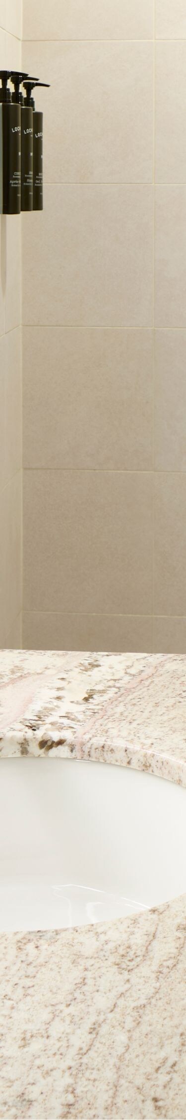 Sleek marble countertop, and modern lighting