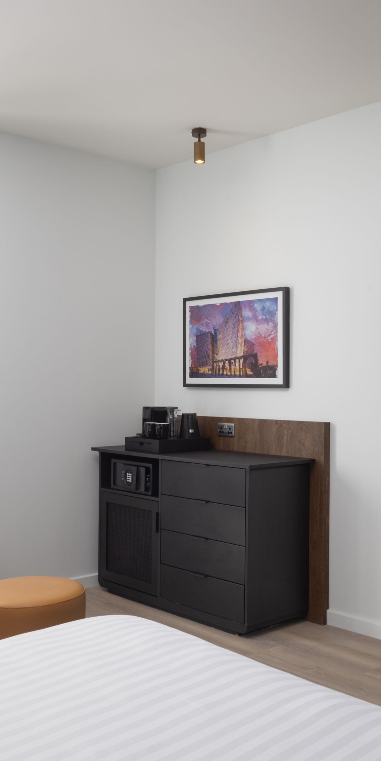View of TV from king bed