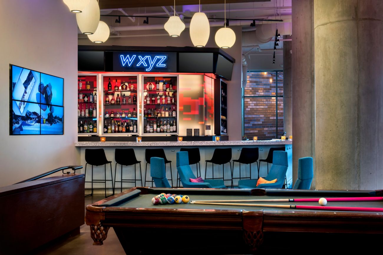 Bar with seating and pool table
