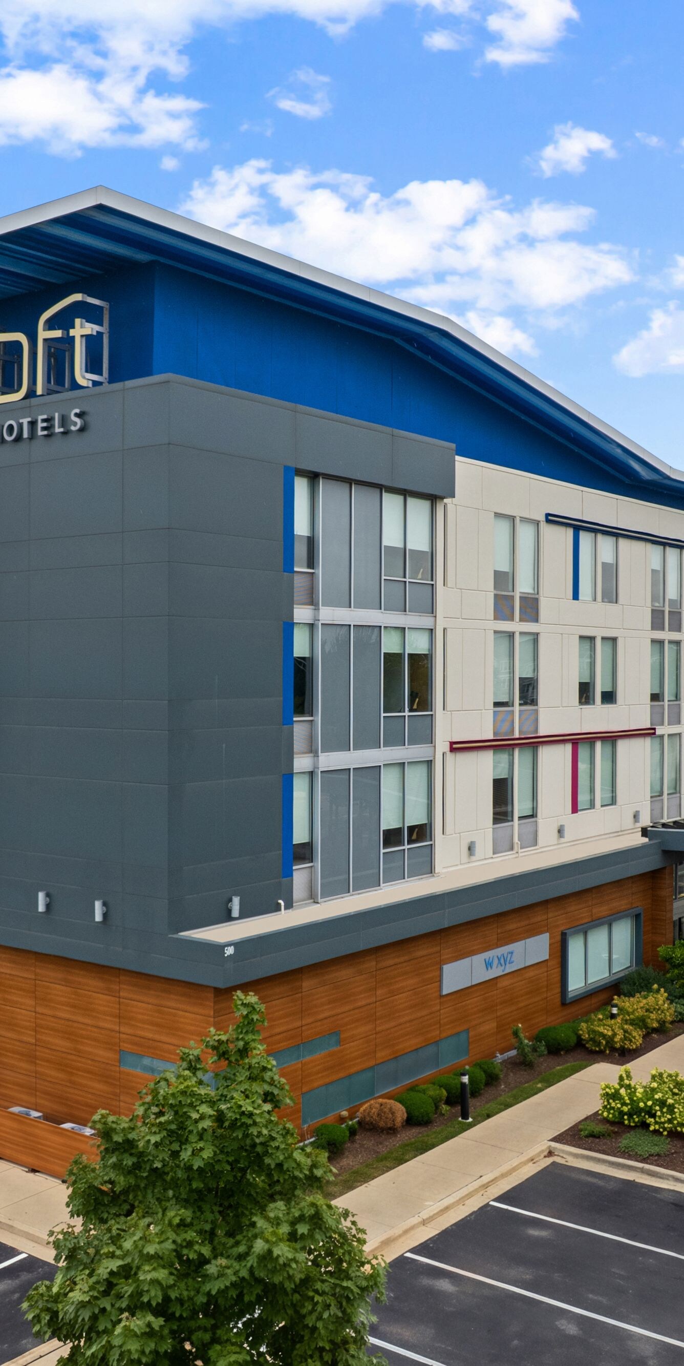 Exterior view of building with parking