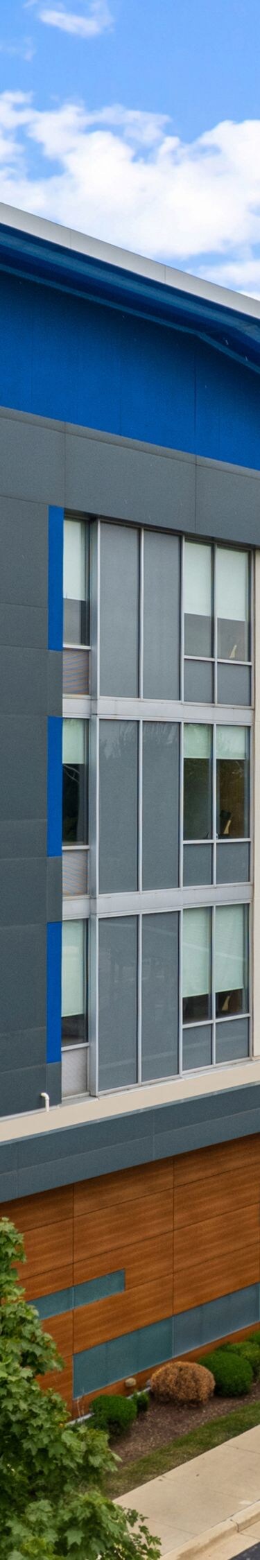 Exterior view of building with parking