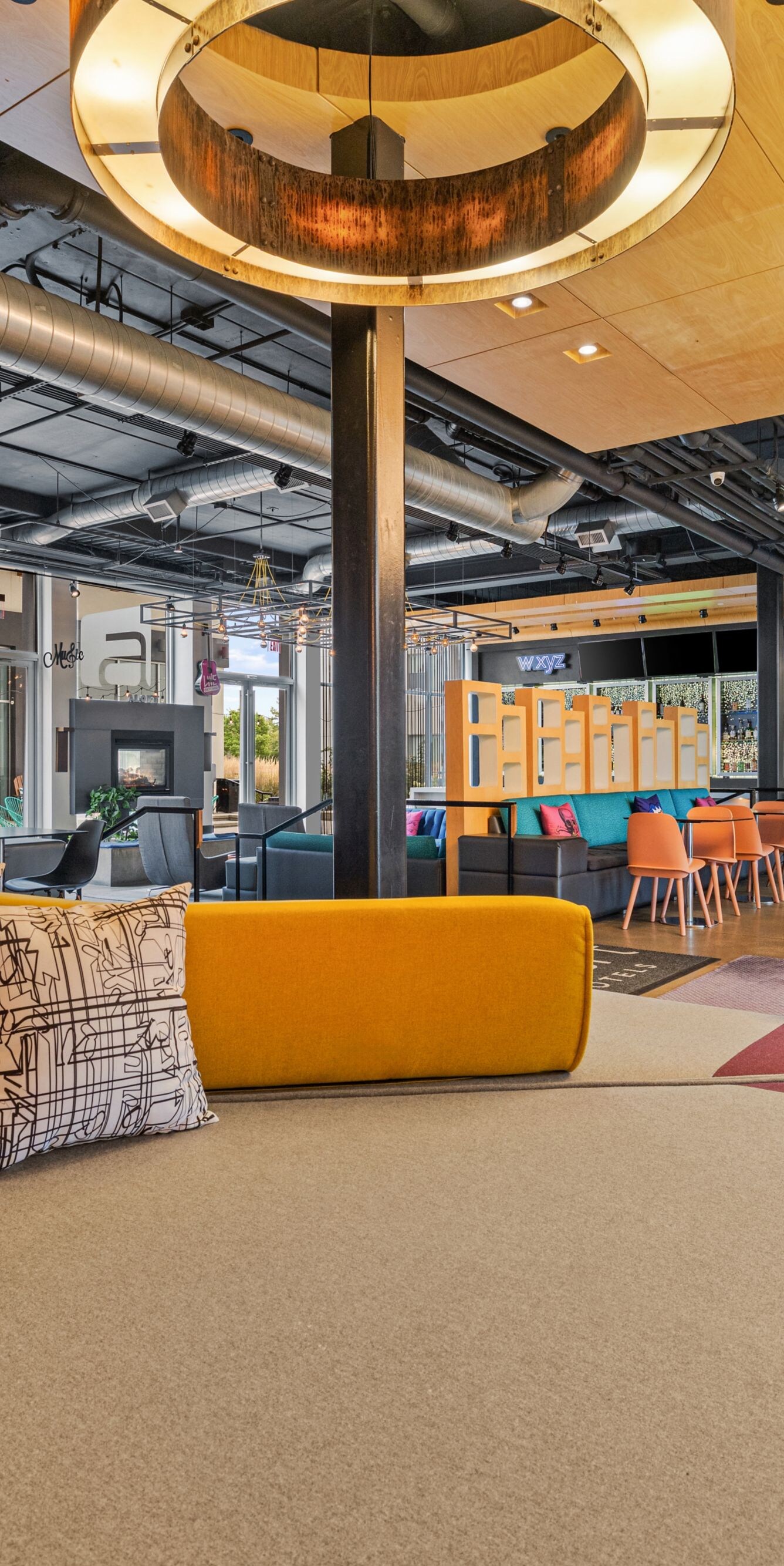 Lobby seating beside colorful design features
