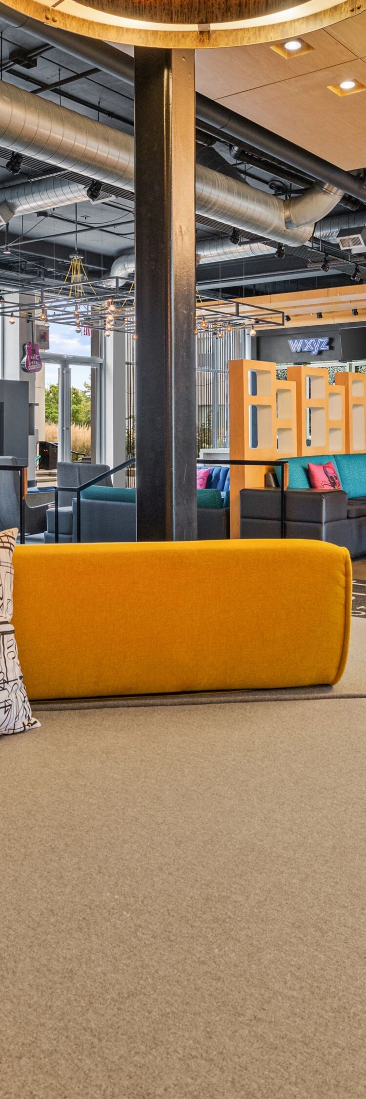 Lobby seating beside colorful design features