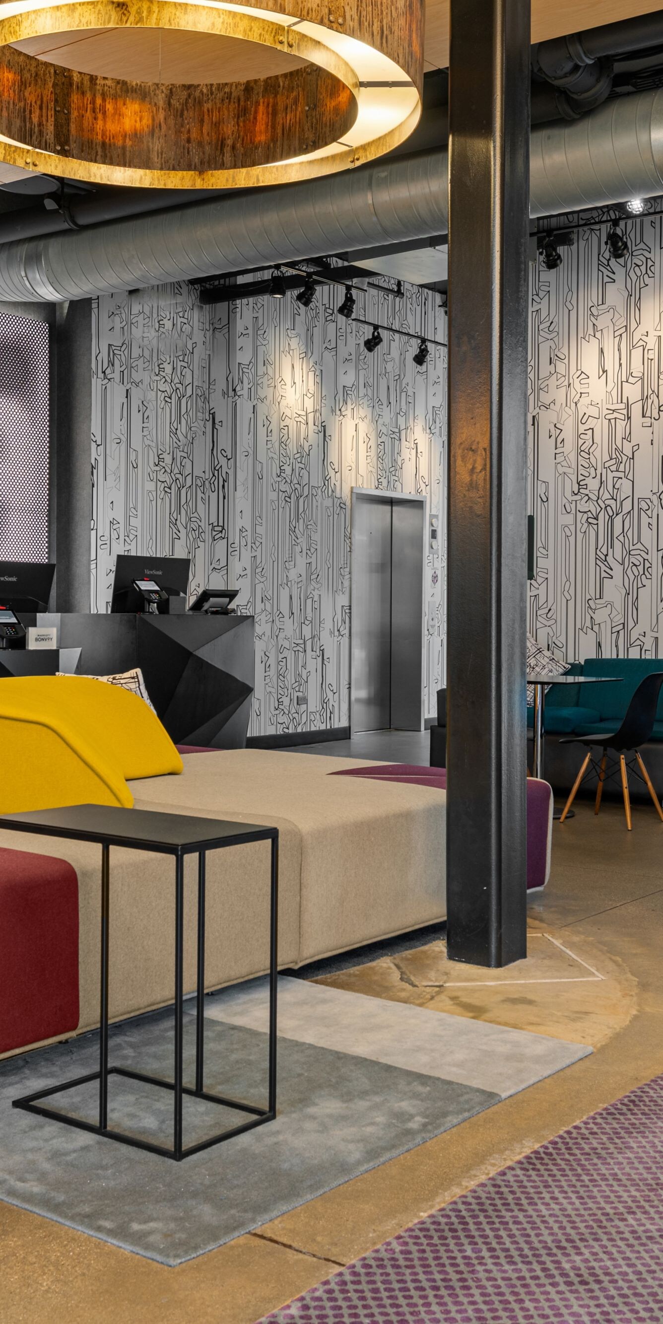 Lobby lounge with colorful upholstered seating