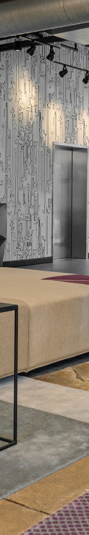 Lobby lounge with colorful upholstered seating