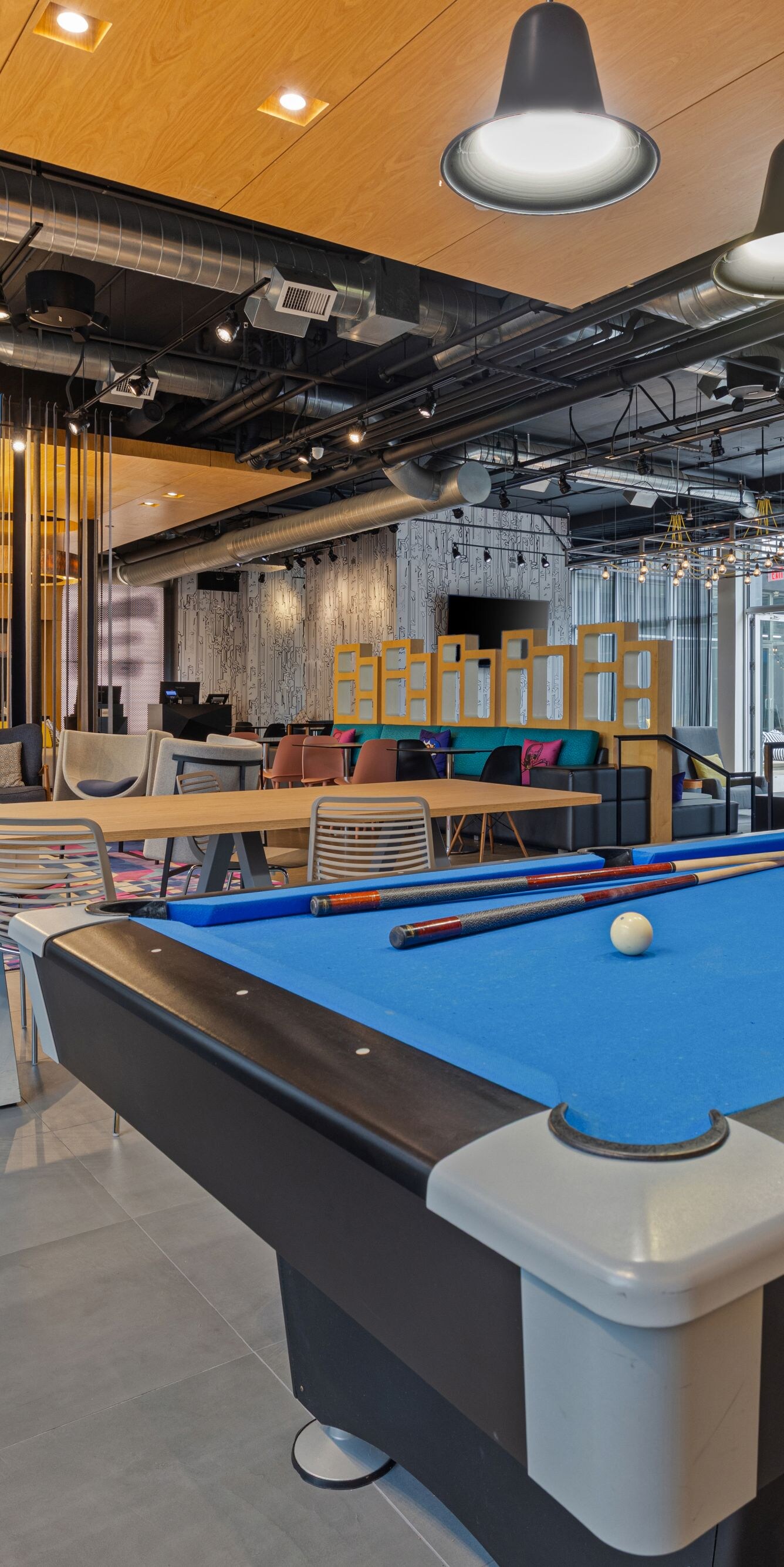 Blue billiards table inside social lounge