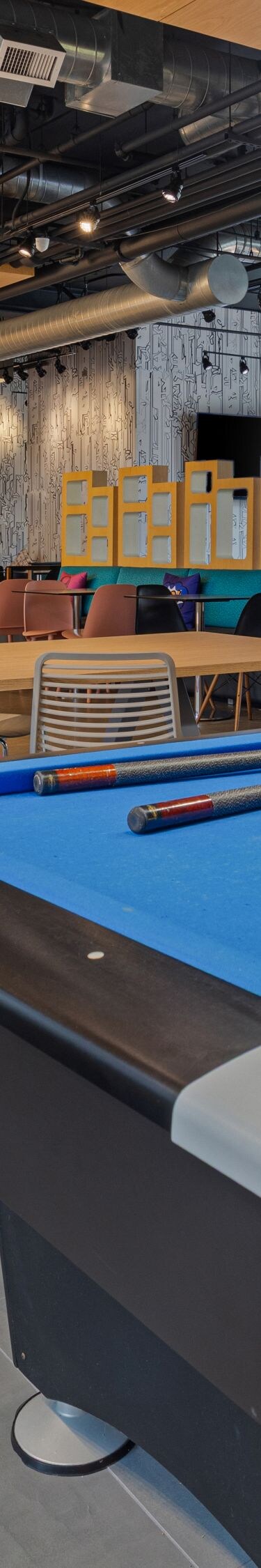 Blue billiards table inside social lounge