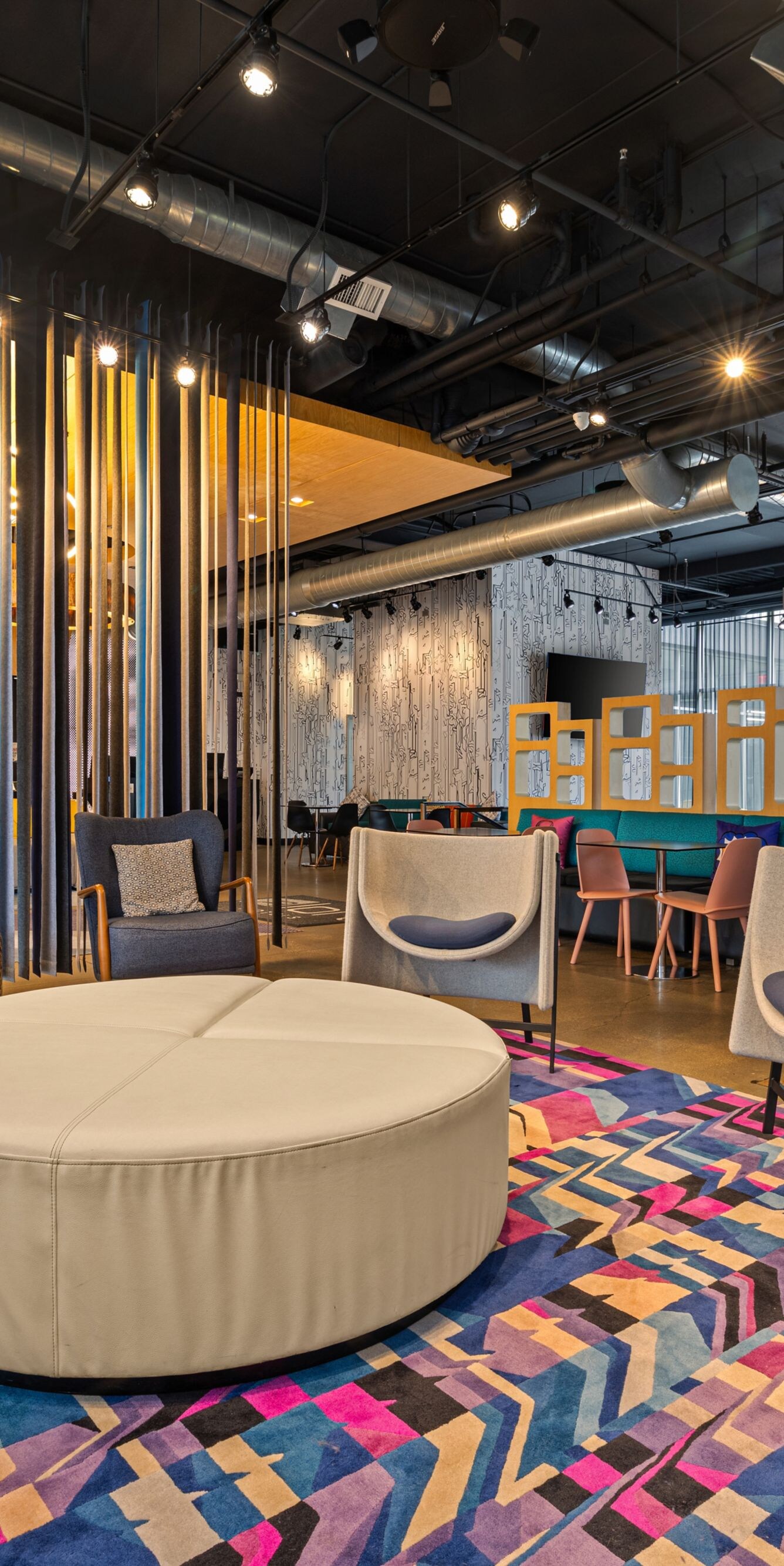 Colorful lounge with varied seating areas