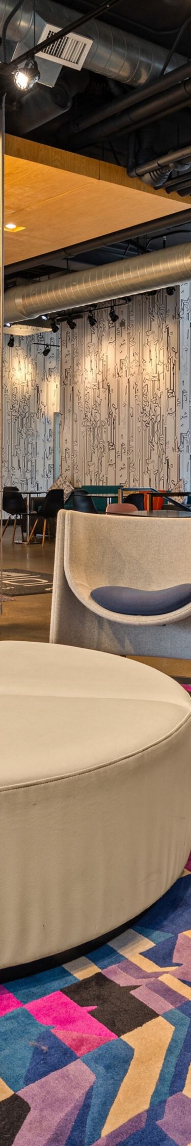 Colorful lounge with varied seating areas