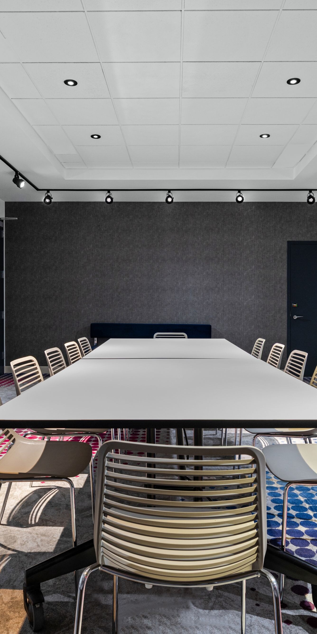 Meeting room with conference table and chairs