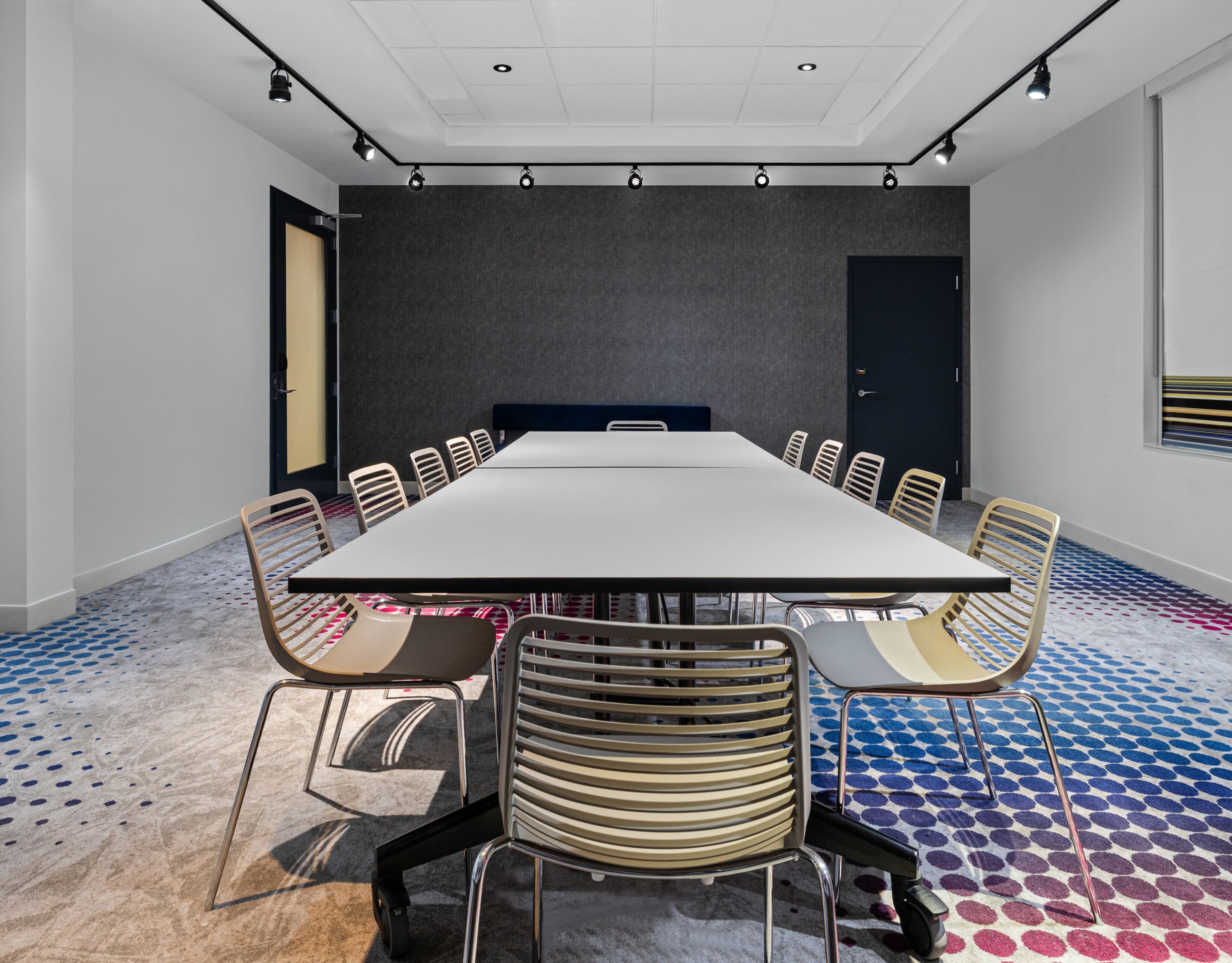 Meeting room with conference table and chairs