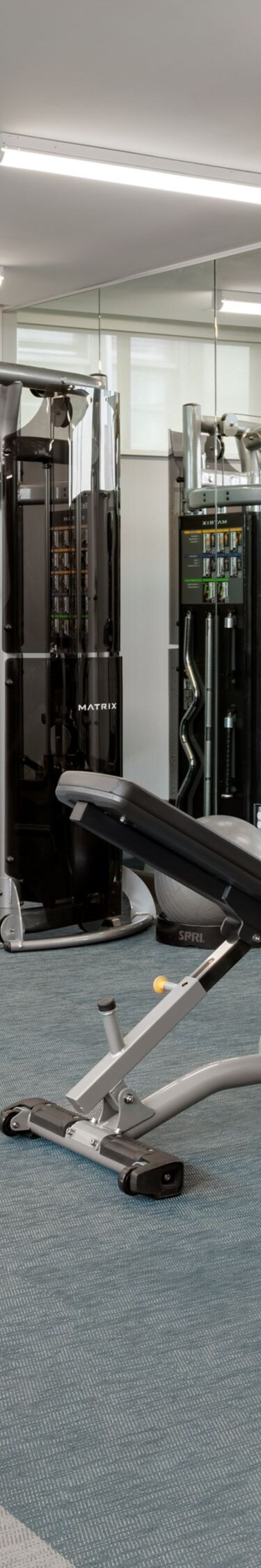 RE:Charge, fitness center room with equipment