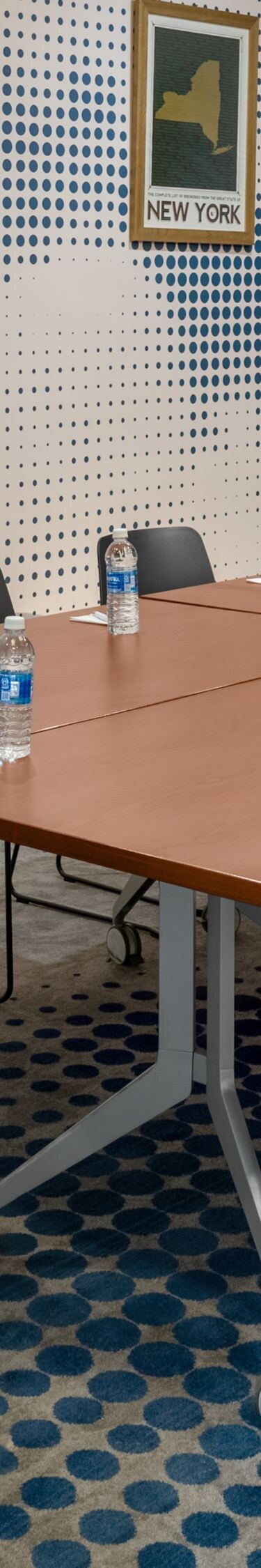 Meeting room with table and wall art