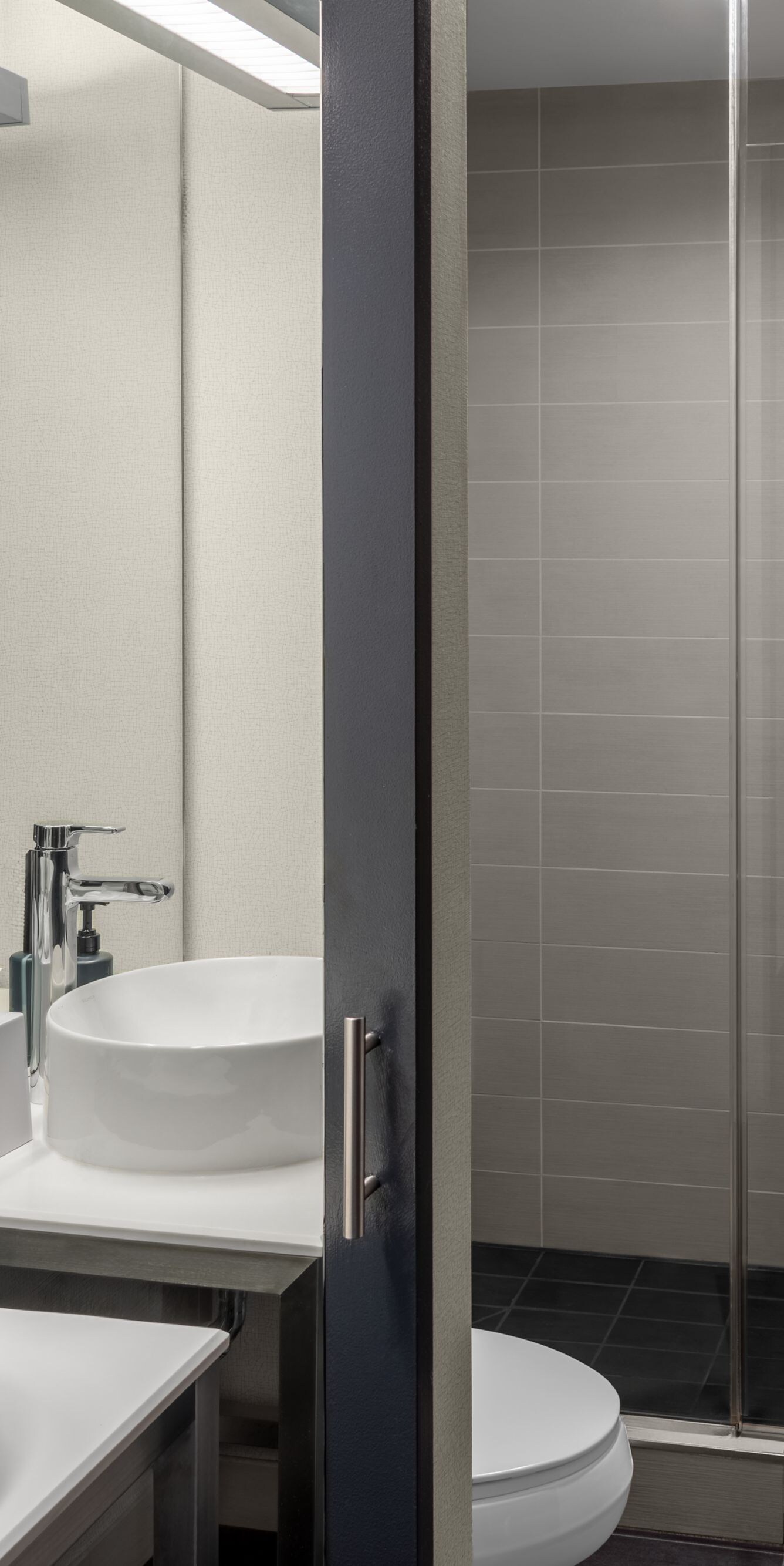 Modern bathroom with glass shower and sink