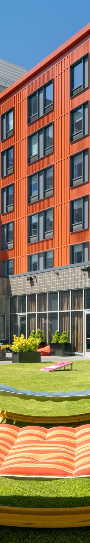Aloft courtyard with hammocks and lawn games