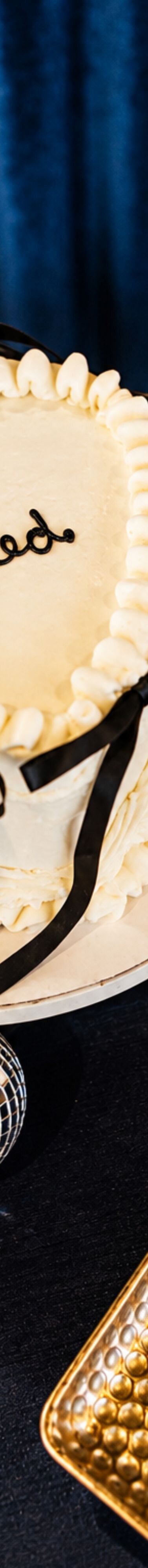 Heart-shaped wedding cake and utensils 