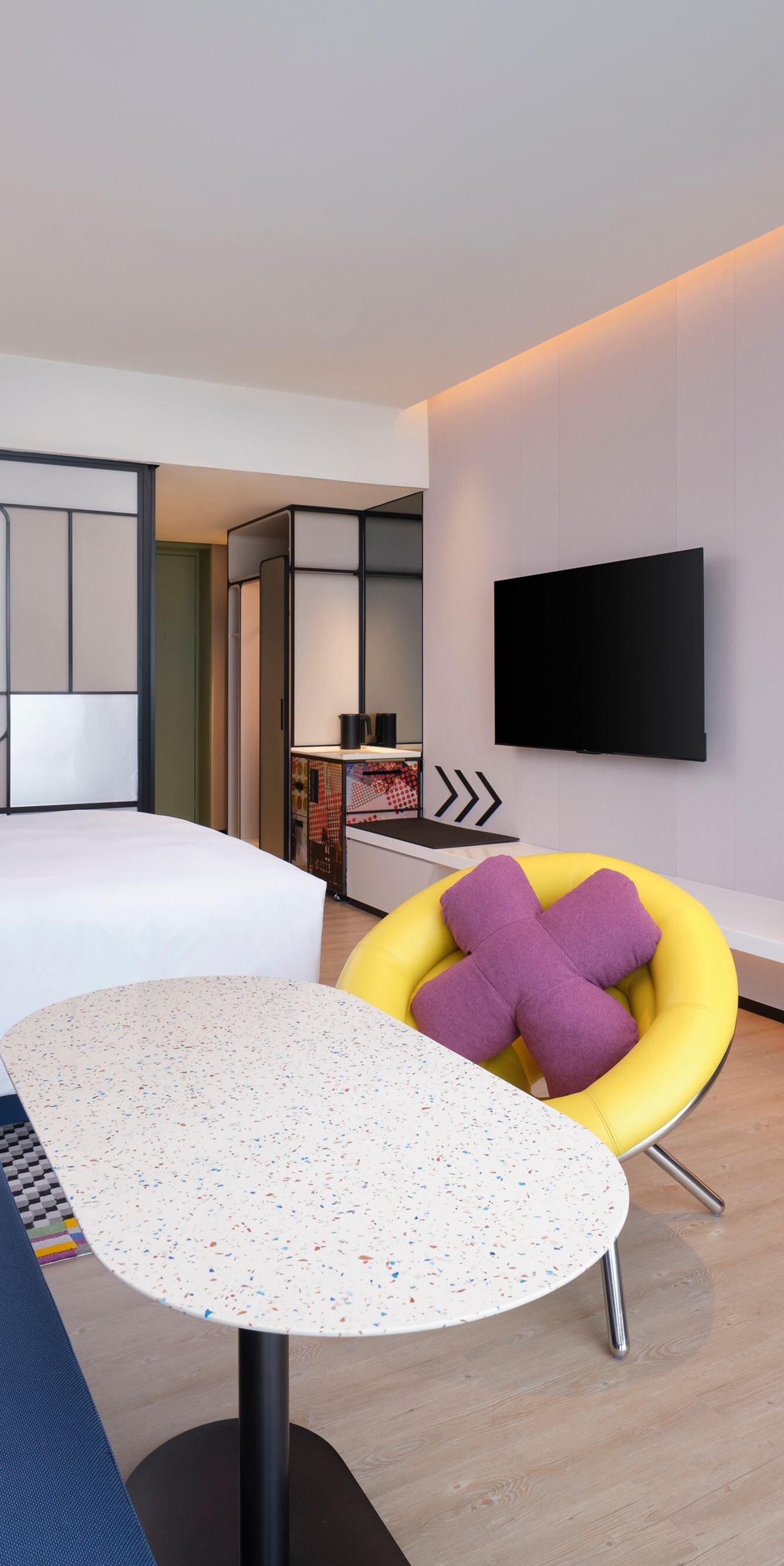bed, desk and chair, sofa, TV