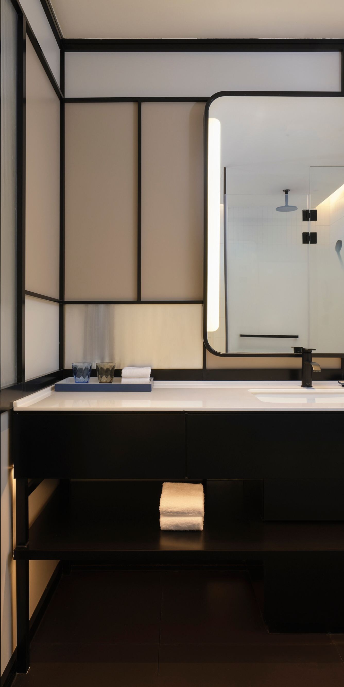 Bathroom Vanity with sink. Walk in shower