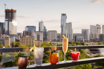 rooftop with drinks and skyline