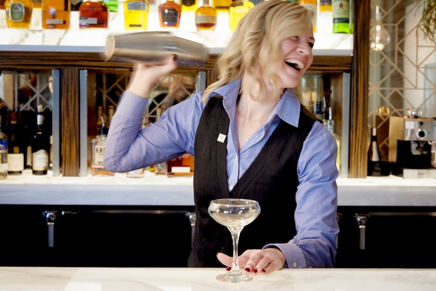 Bartender shaking cocktail 