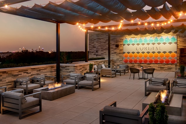 Roof top lounge open area with seating and view