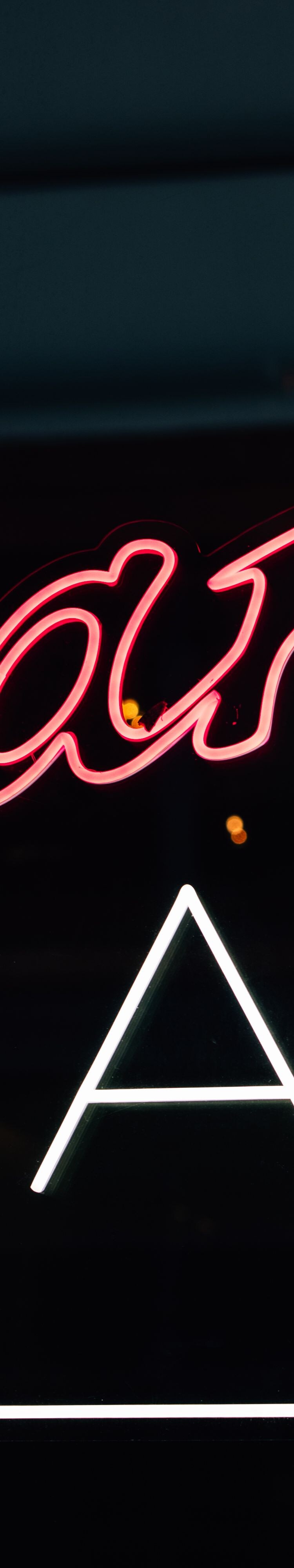 bar ac neon sign in the window