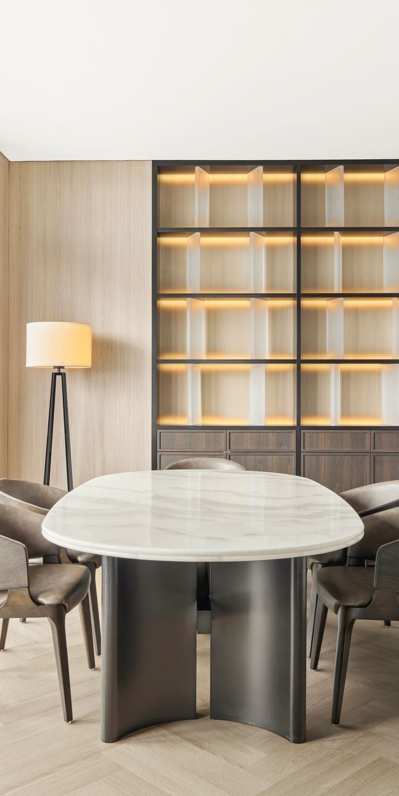 Modern dining area with skyline window views