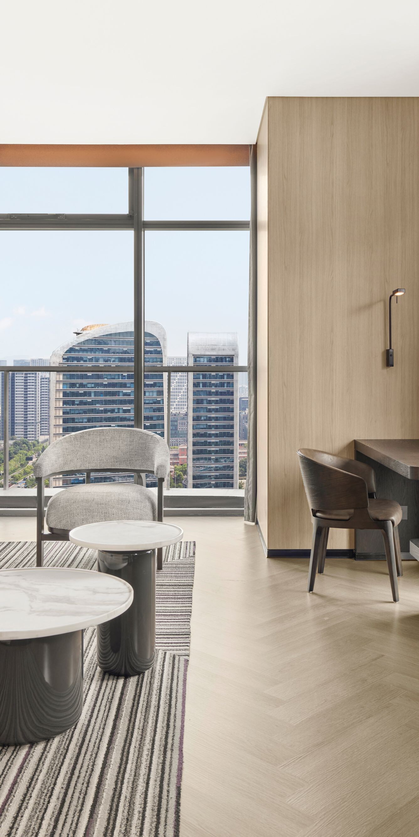 Modern suite lounge with skyline city views