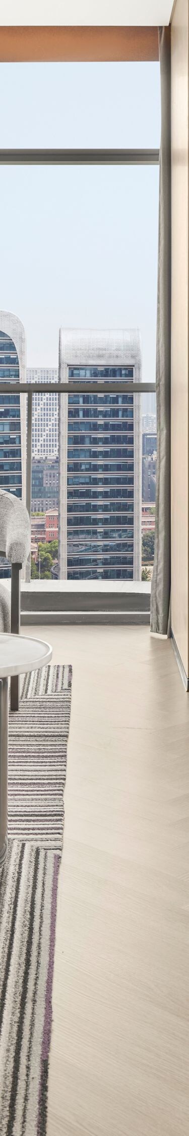 Modern suite lounge with skyline city views