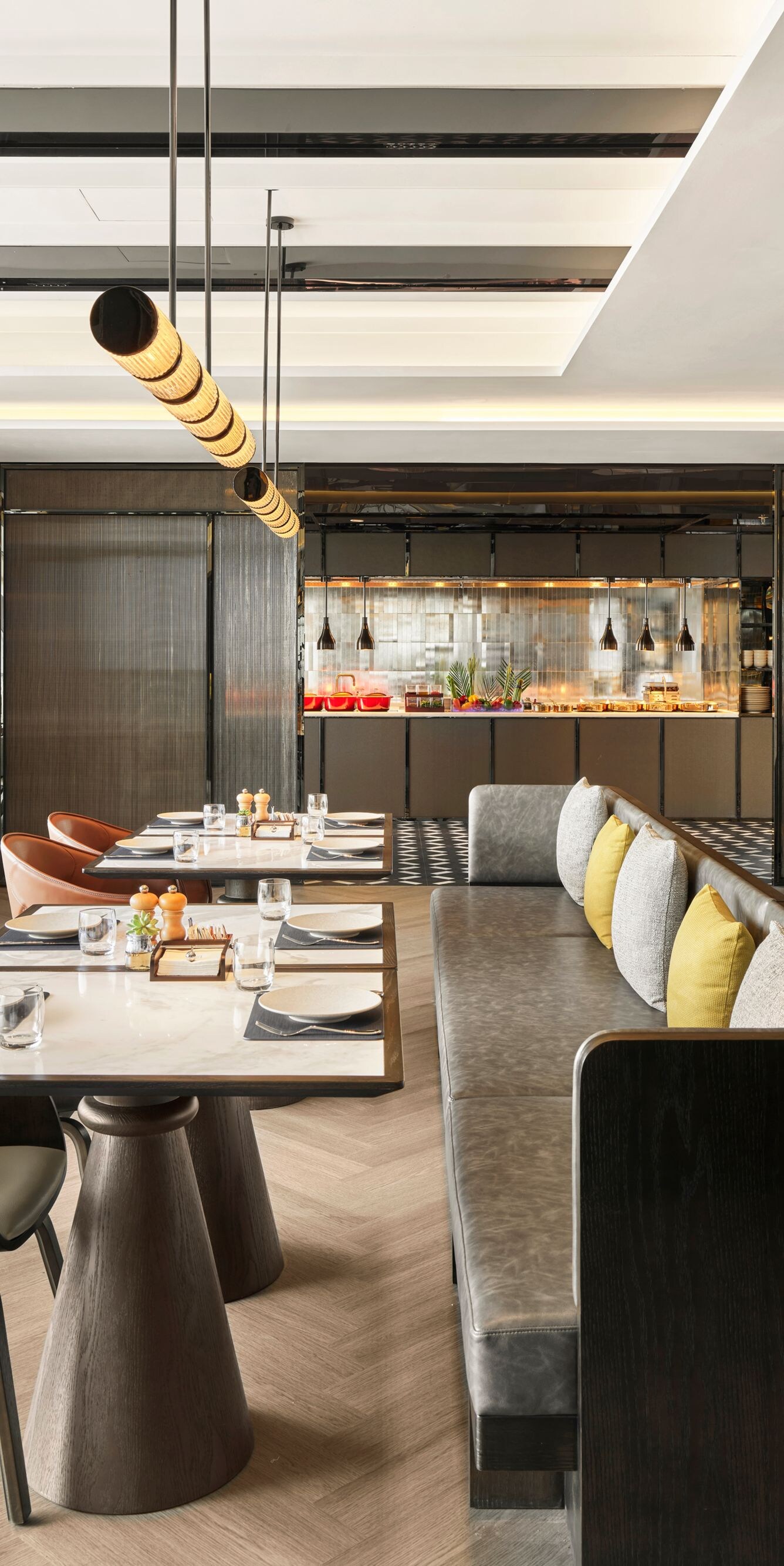 hotel restaurant with booth seating and tables