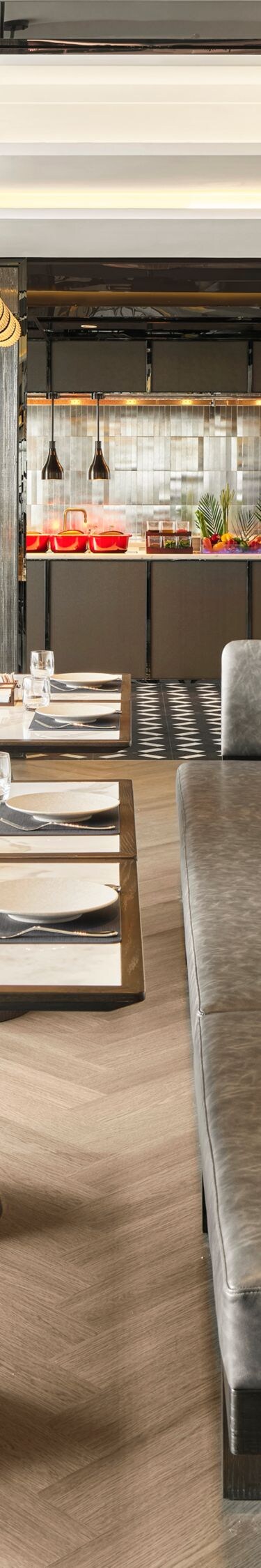 hotel restaurant with booth seating and tables
