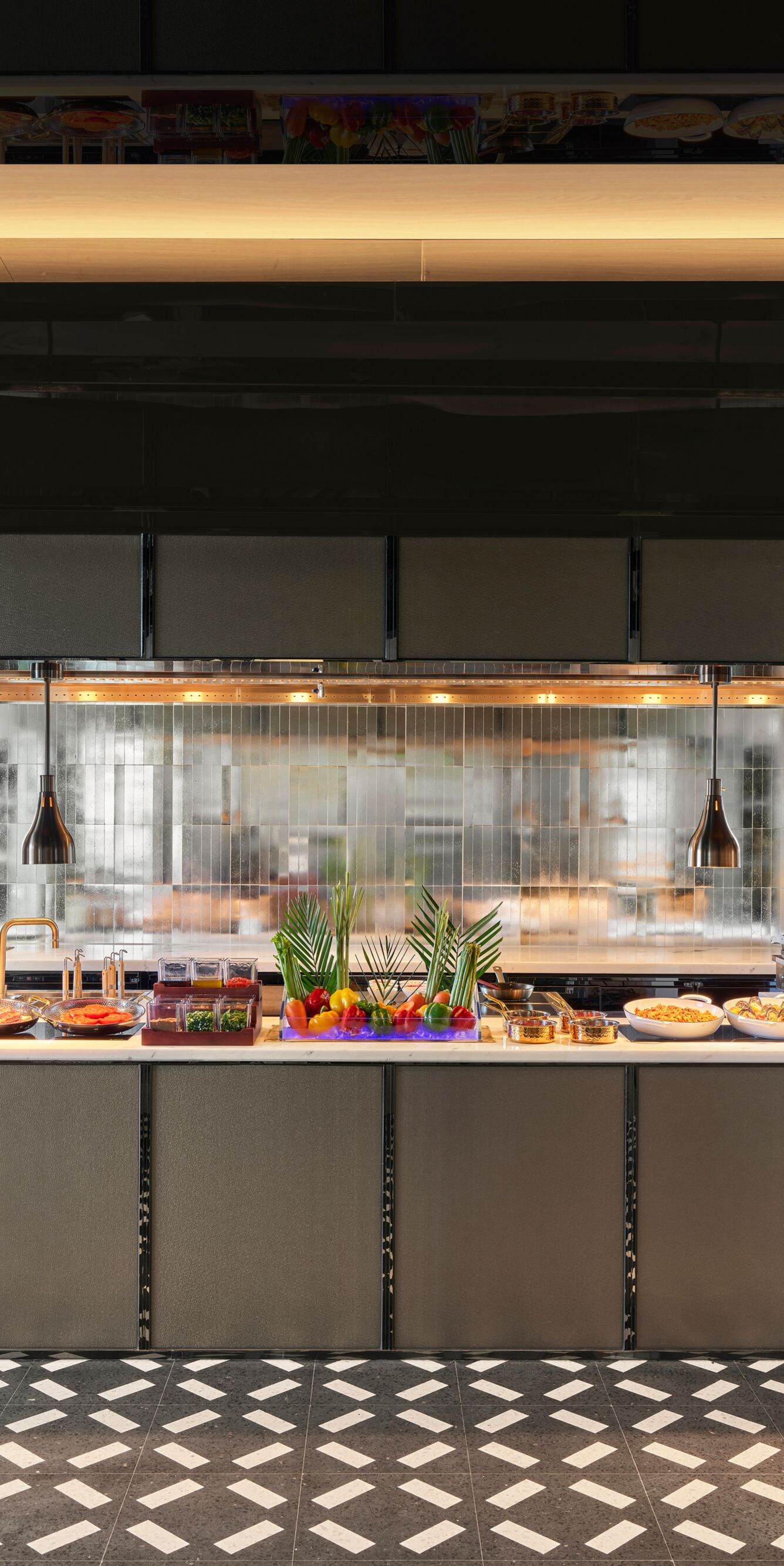 Buffet station with assorted breakfast dishes