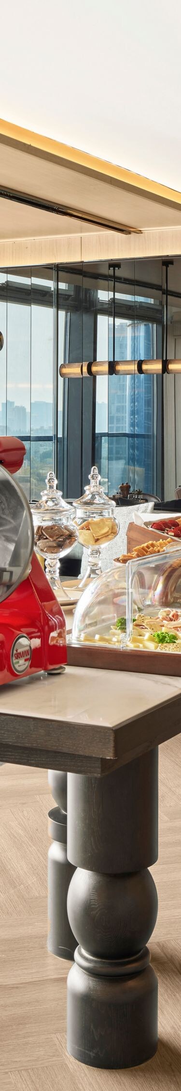 Buffet dining area with food stations and views