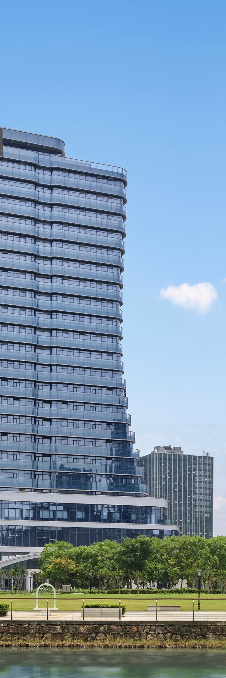 Exterior of hotel next to water