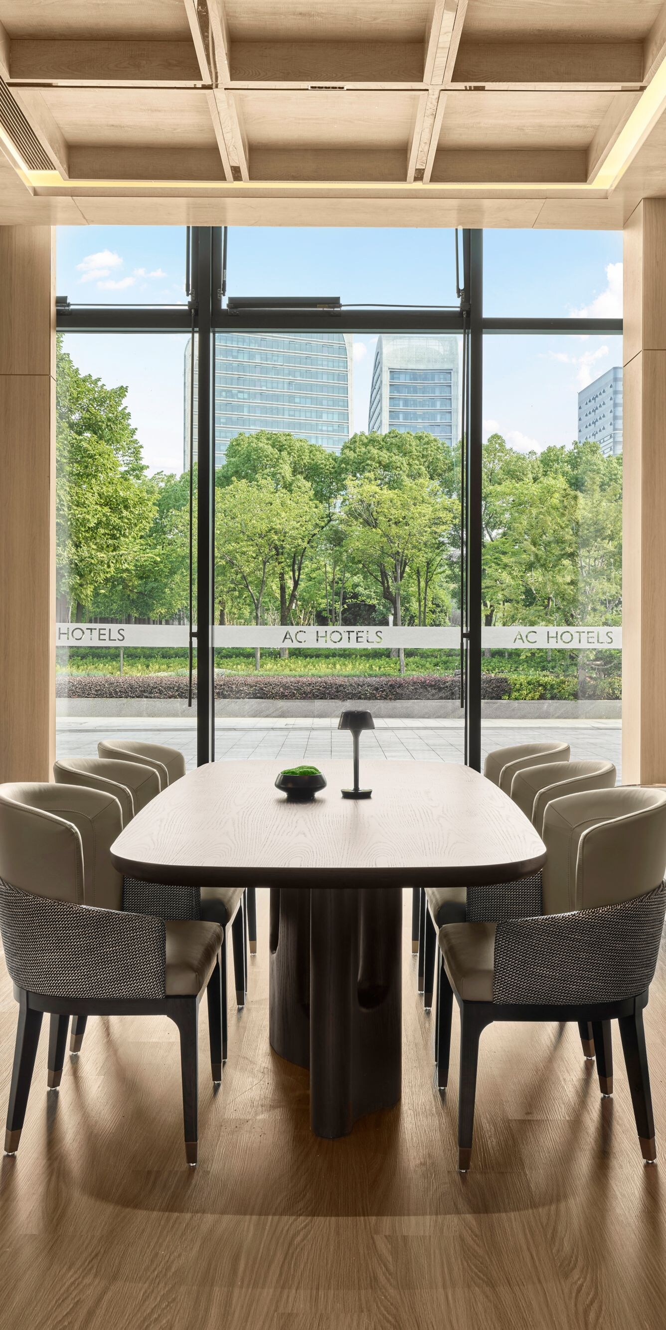 Modern meeting room with table and lounge seating