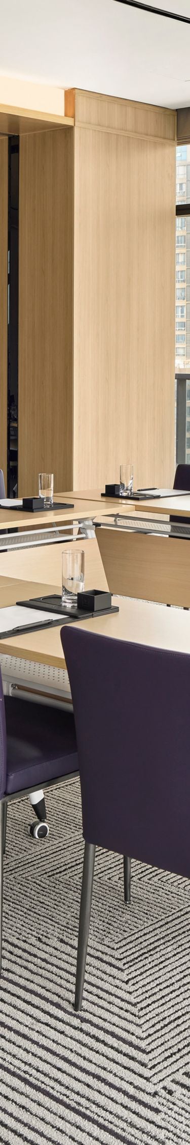 Boardroom with U-shaped meeting table setup