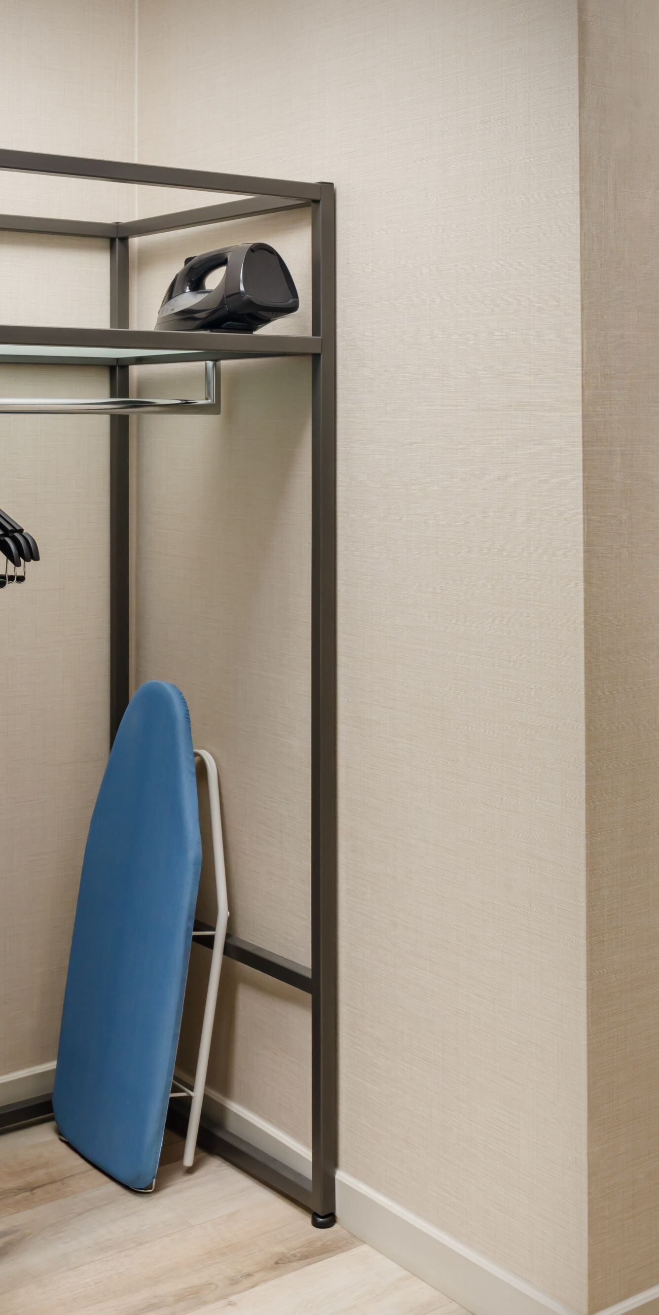 Accessible closet space featuring low hanging rod