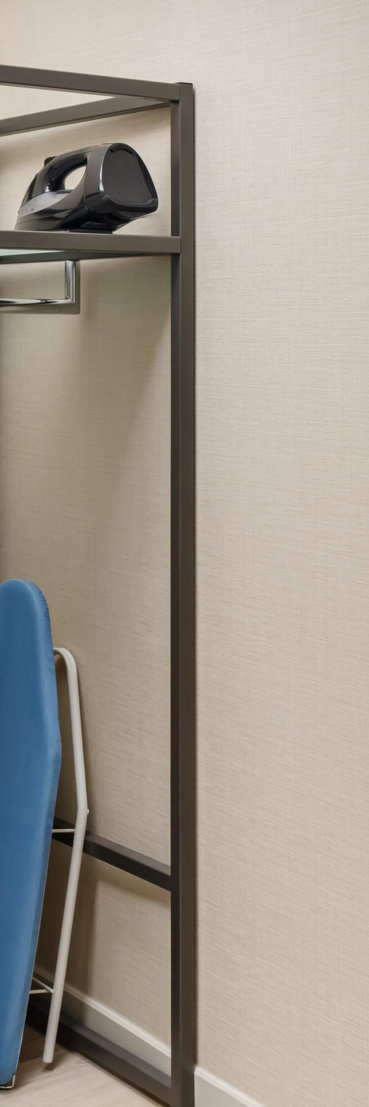 Accessible closet space featuring low hanging rod