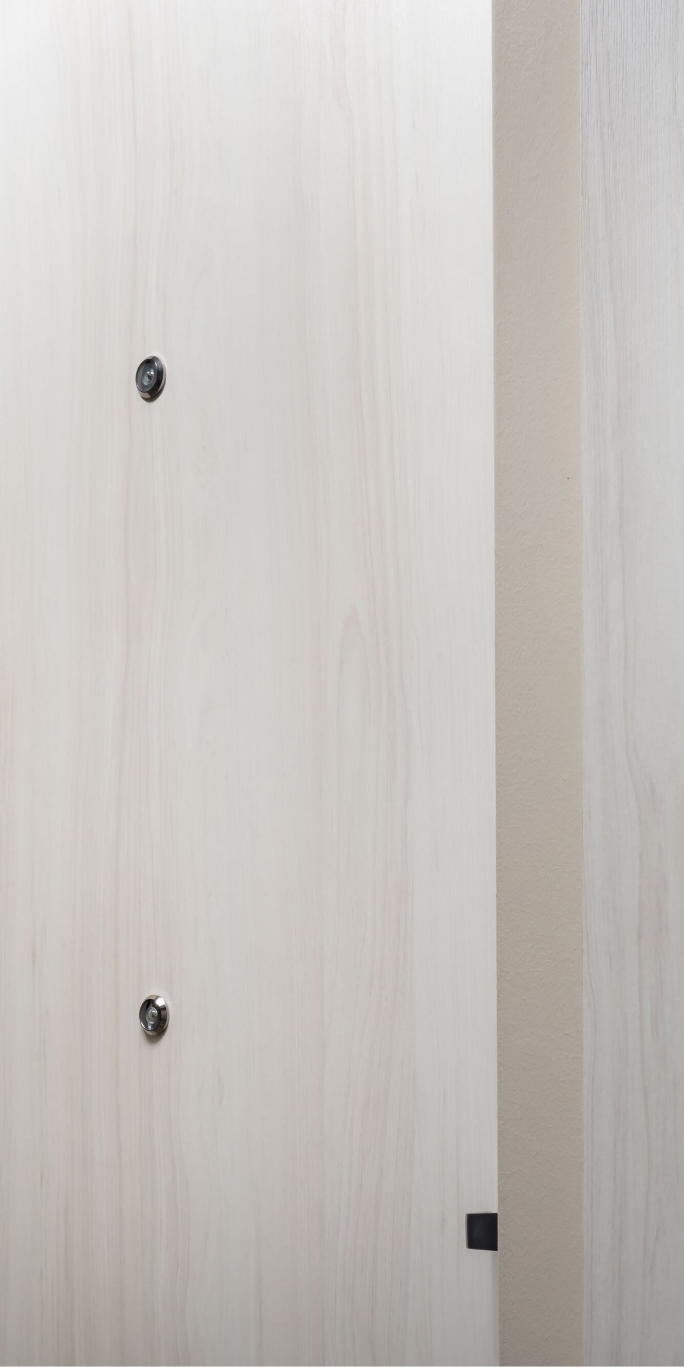 Accessible doorbell button mounted outside room