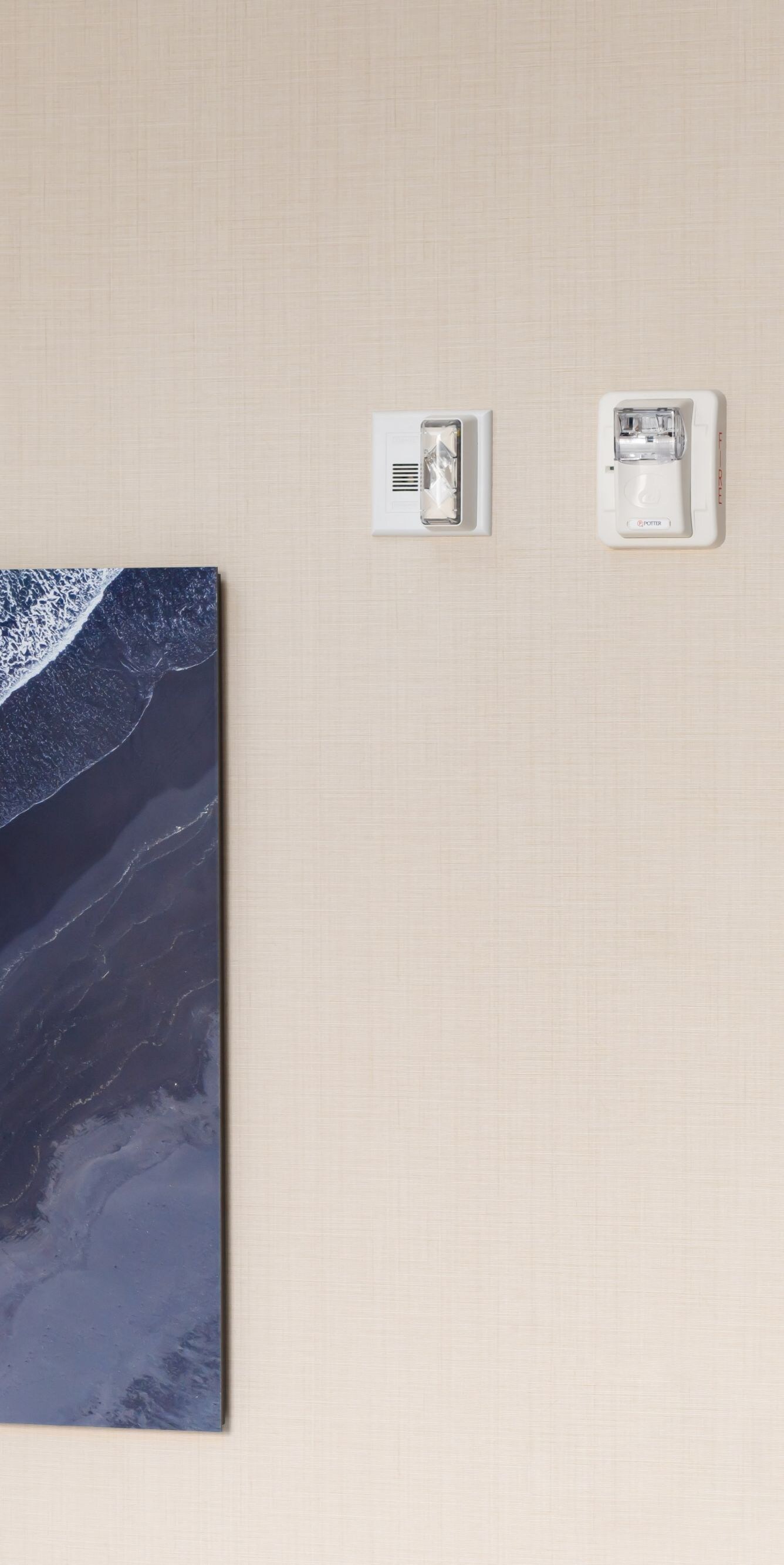 Visual alert flasher mounted in Hearing ADA room