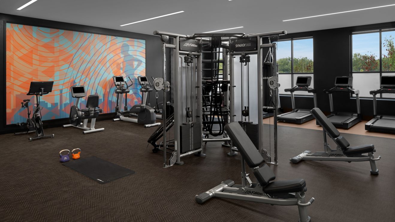 fitness room with machines