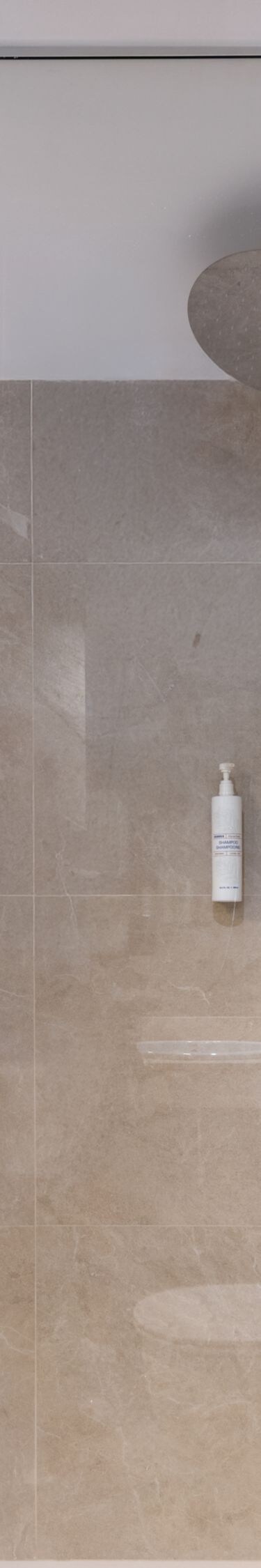 Walk-in shower with rainfall showerhead