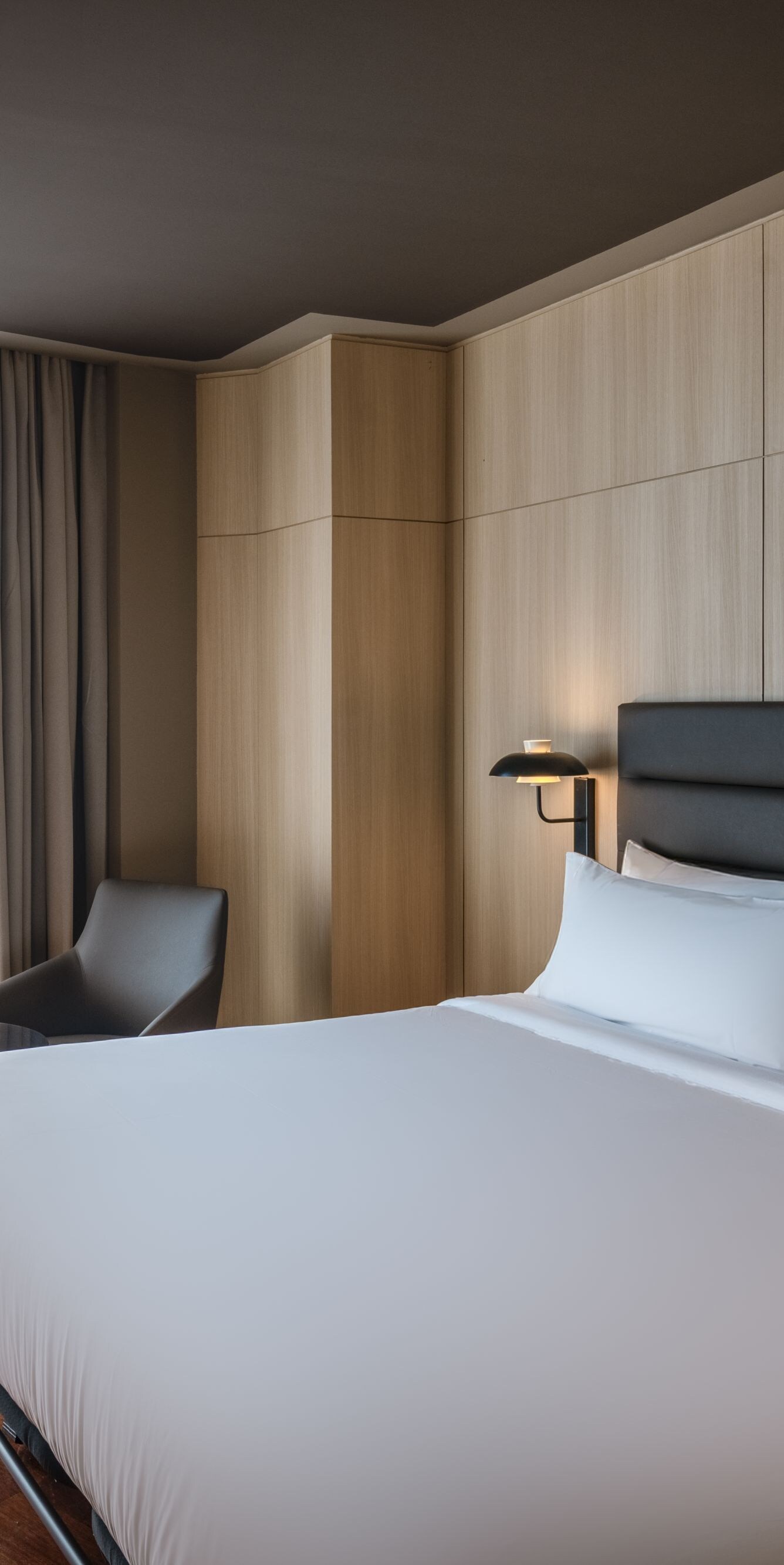 King guest room with balcony and city view