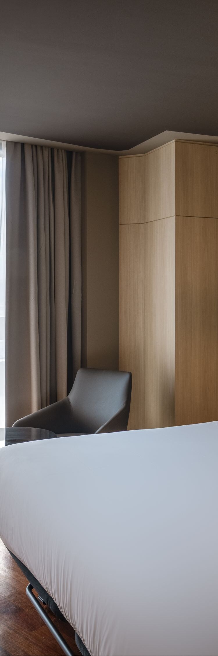 King guest room with balcony and city view